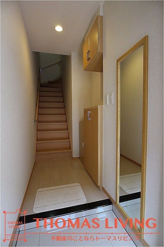 ヴィラージュ新木屋瀬 玄関