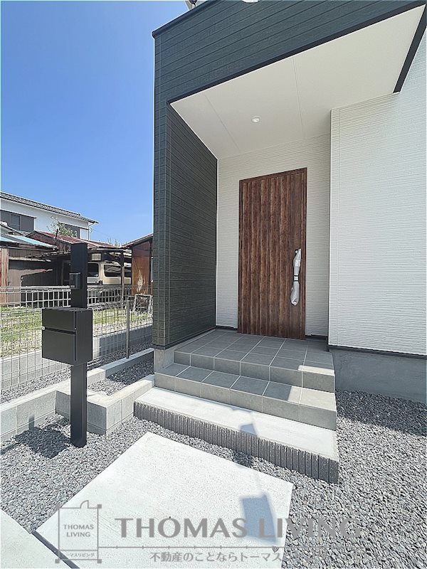 遠賀郡水巻町猪熊9丁目1期　1号棟 現地写真（玄関）